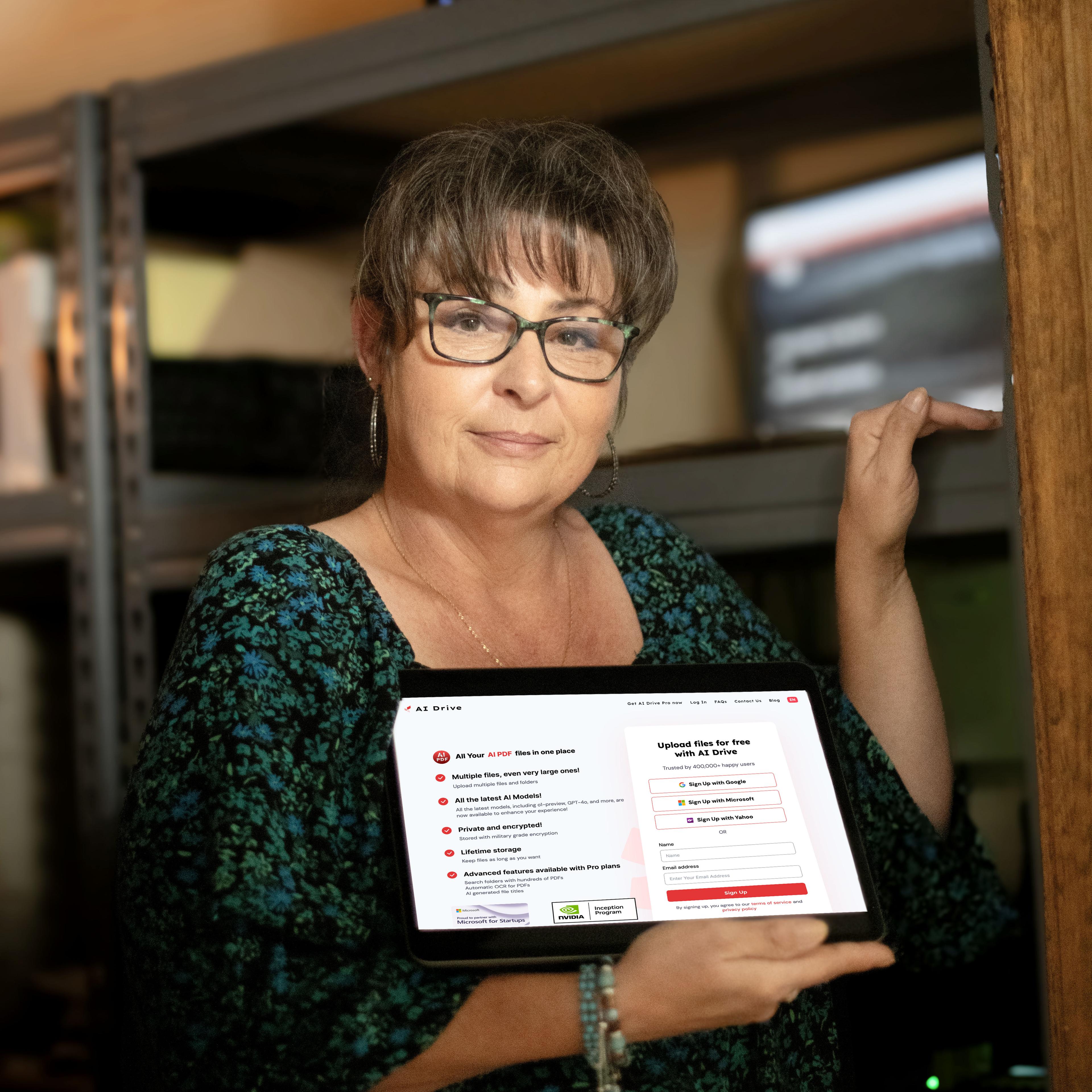 Government employee showcasing AI Drive's feature-rich landing page on a tablet, highlighting the platform's capabilities including file management and secure storage